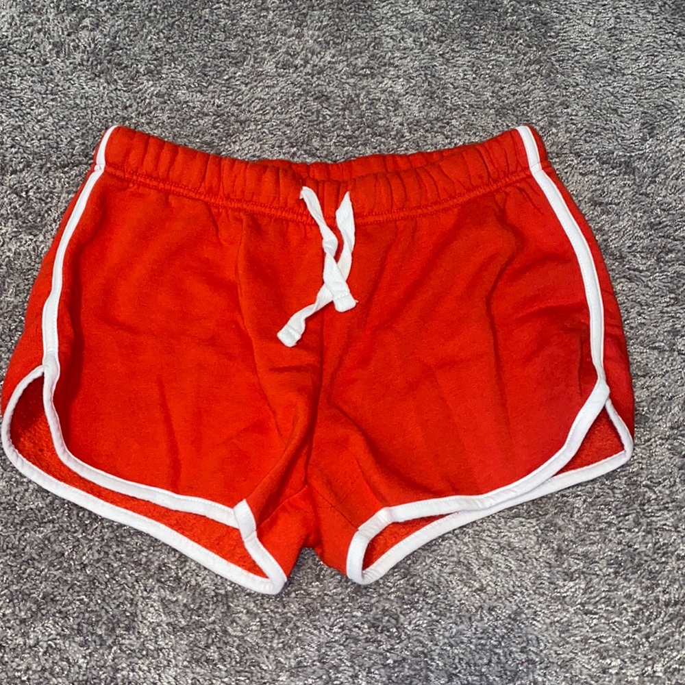red shorts